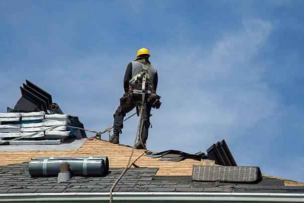 Professional Roofing technician working in Mecklenburg, NY
